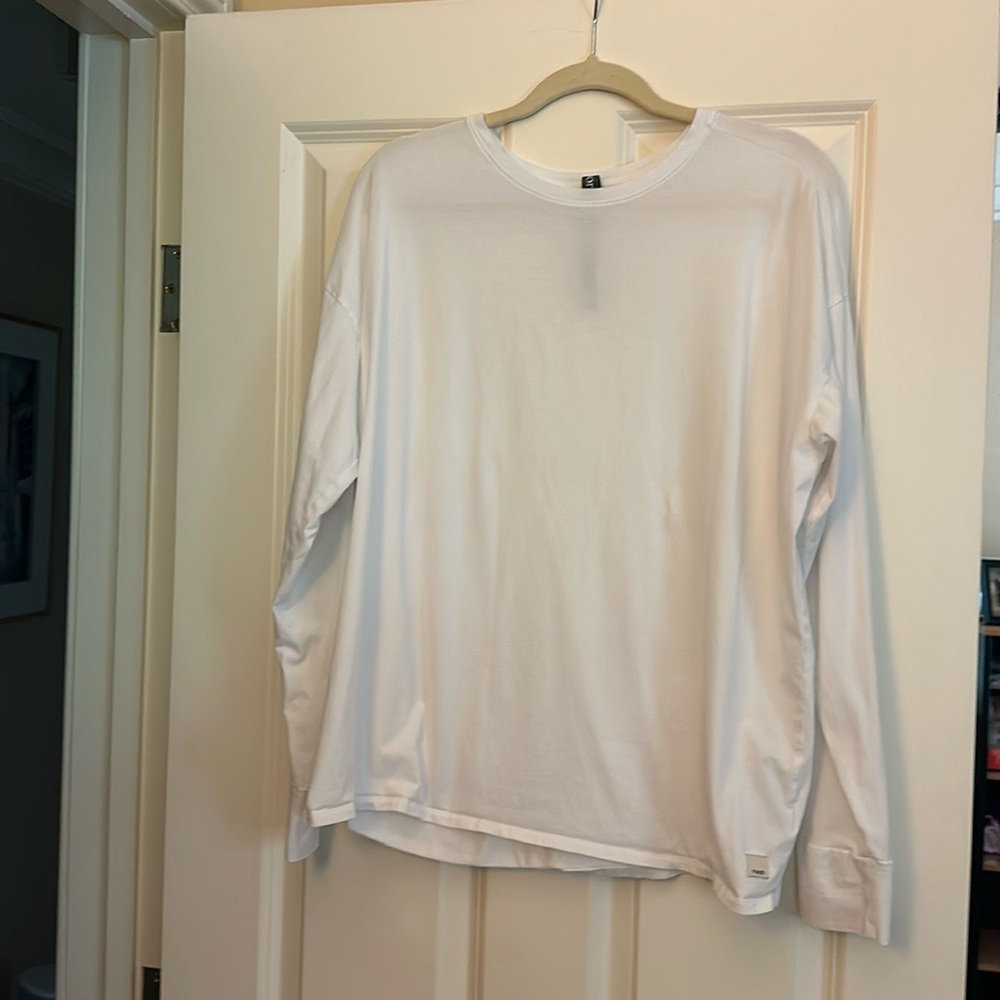 Vuori Women’s long-sleeve feather tee.  White. Size: Large